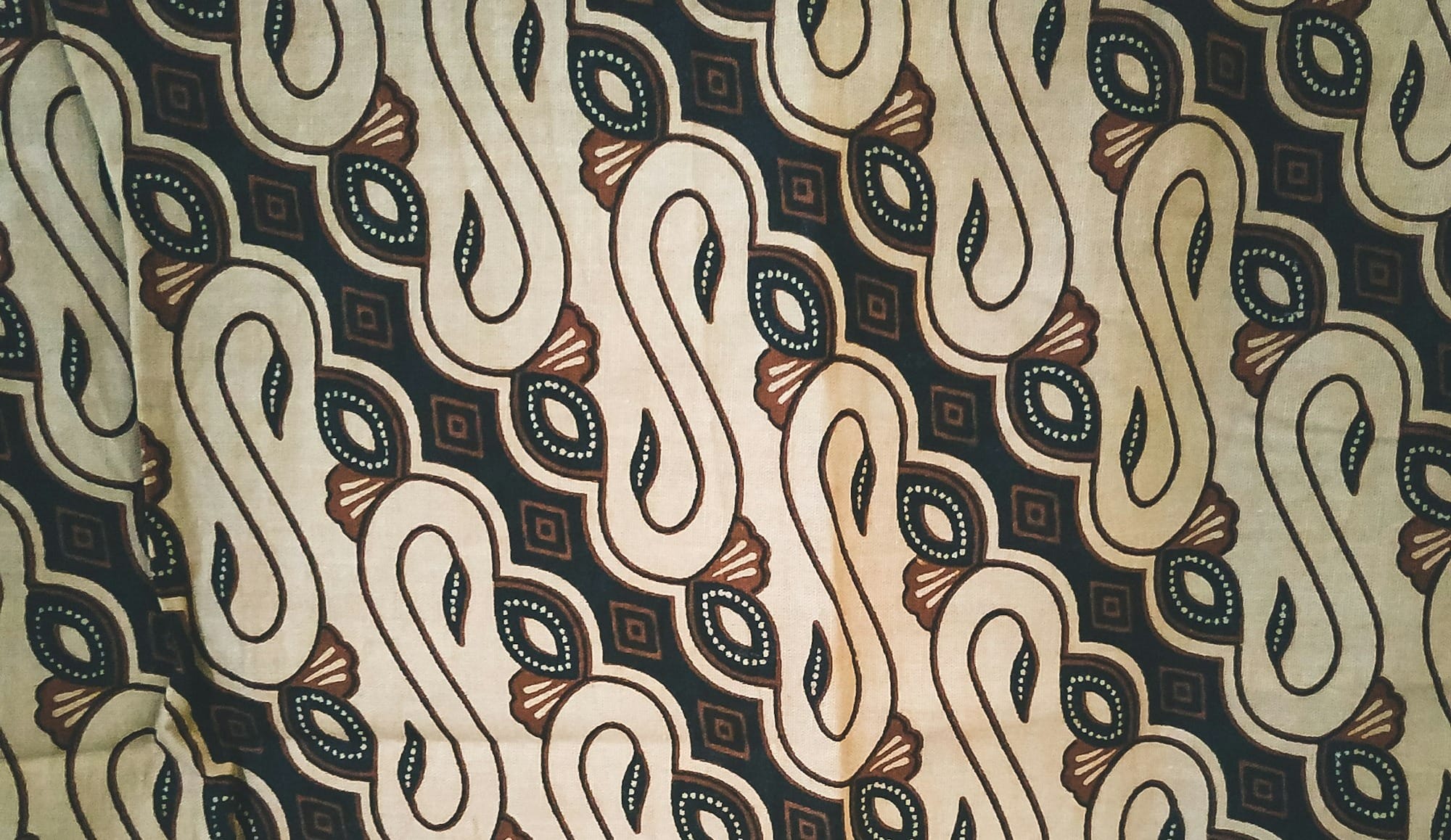 white black and brown textile